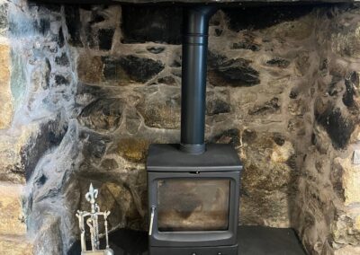 Log burner at Pennant Igyn Holiday Cottage
